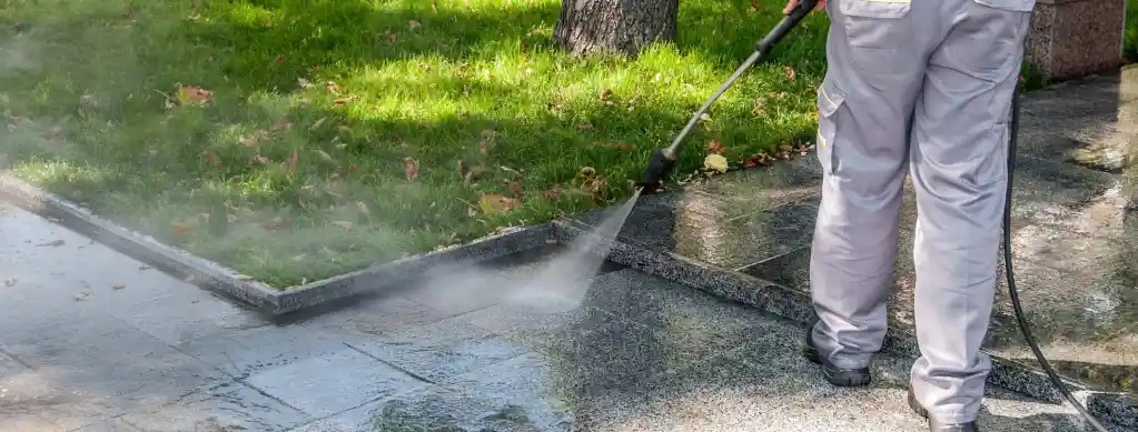Image of a Seattle driveway being pressure washed